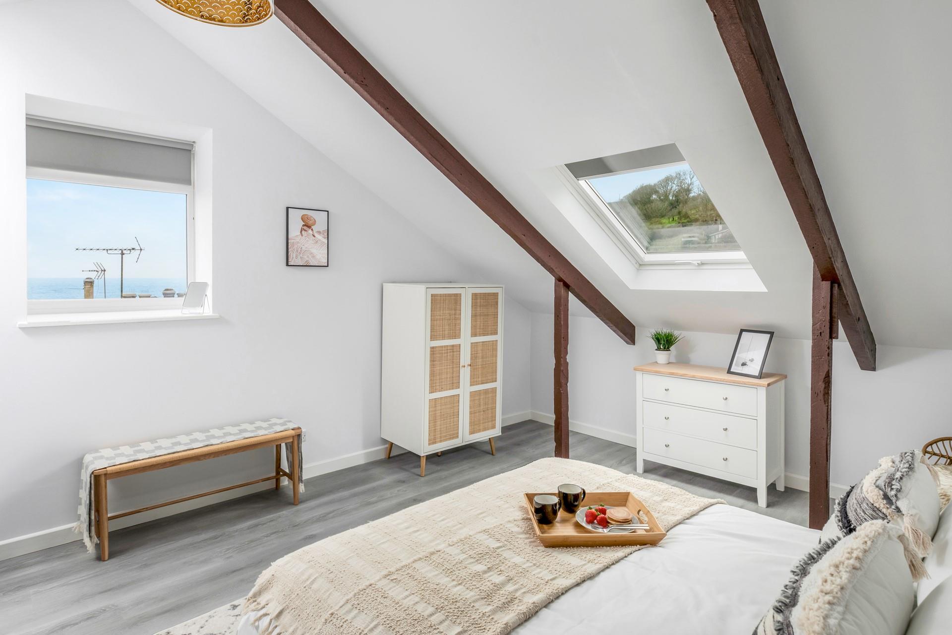 Wake up to glimpses of the tranquil calm waters in Mousehole.