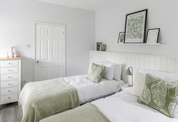 Zip and link beds in bedroom 1 allow for flexible sleeping arrangements.