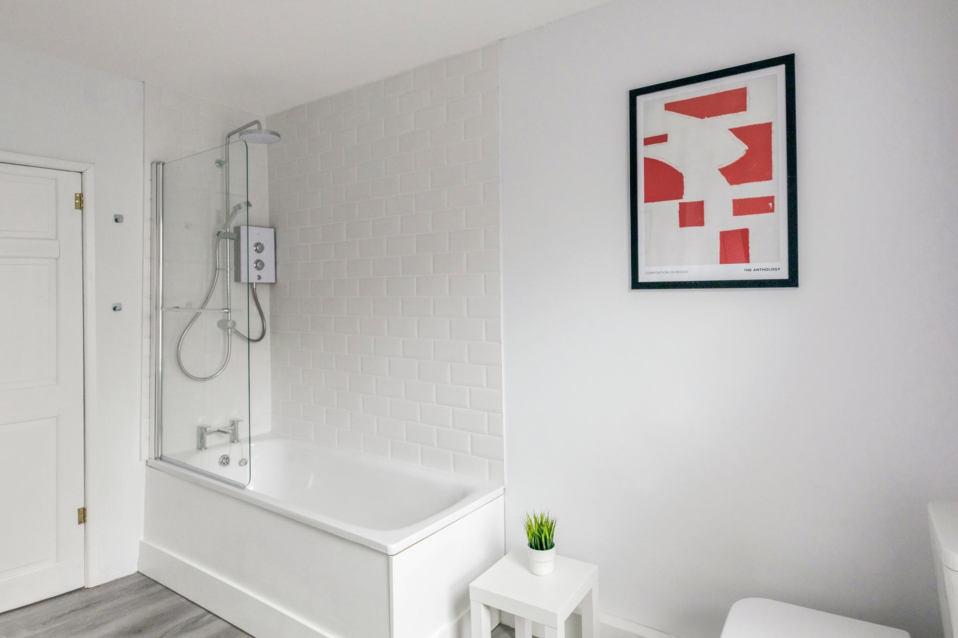 The family bathroom has a bath for relaxing in the bubbles.