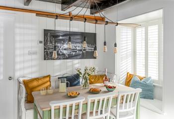 Gather the family together around the nautical-style dining table.