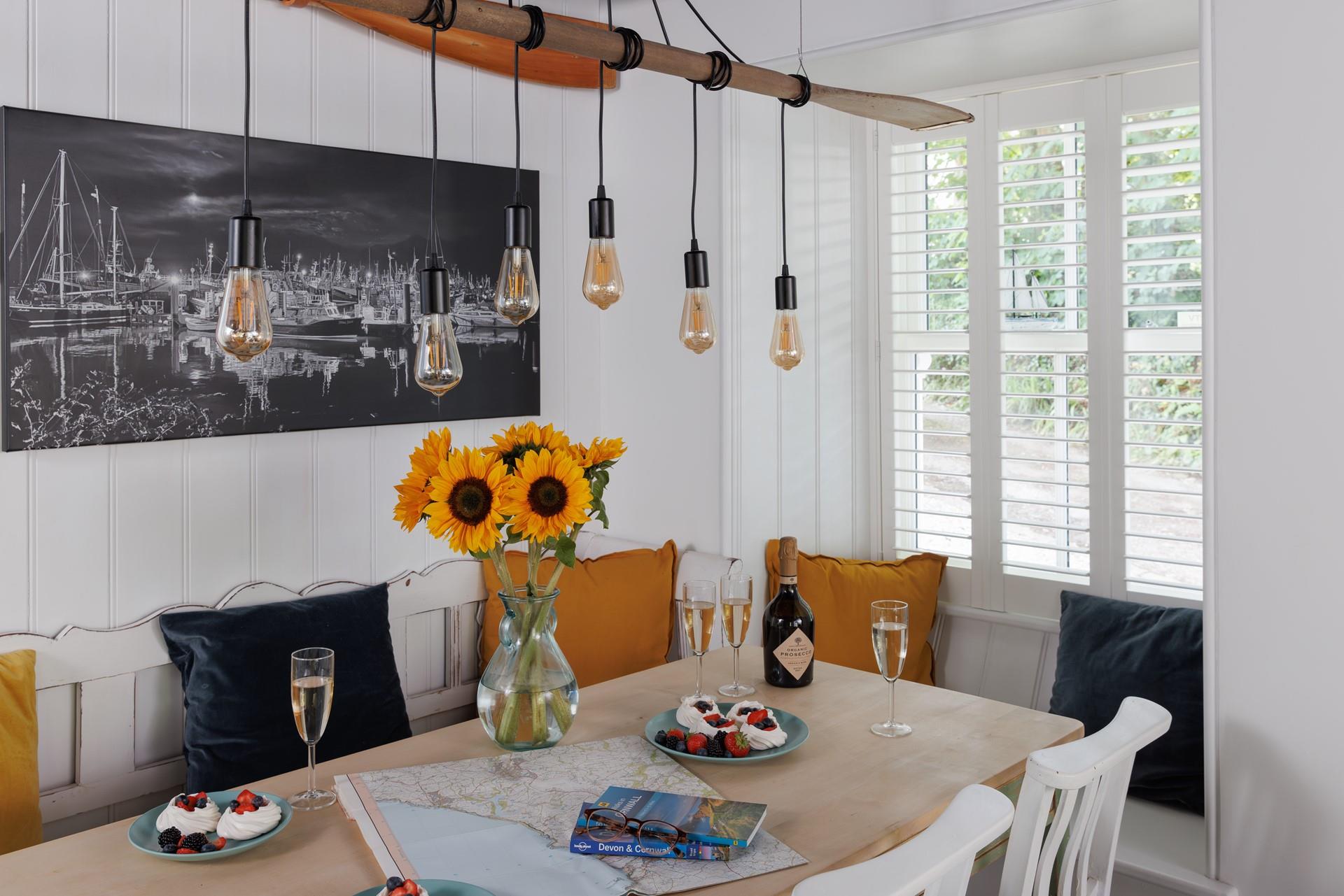Gather the family together around the spacious dining table.