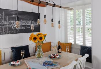 Gather the family together around the spacious dining table.