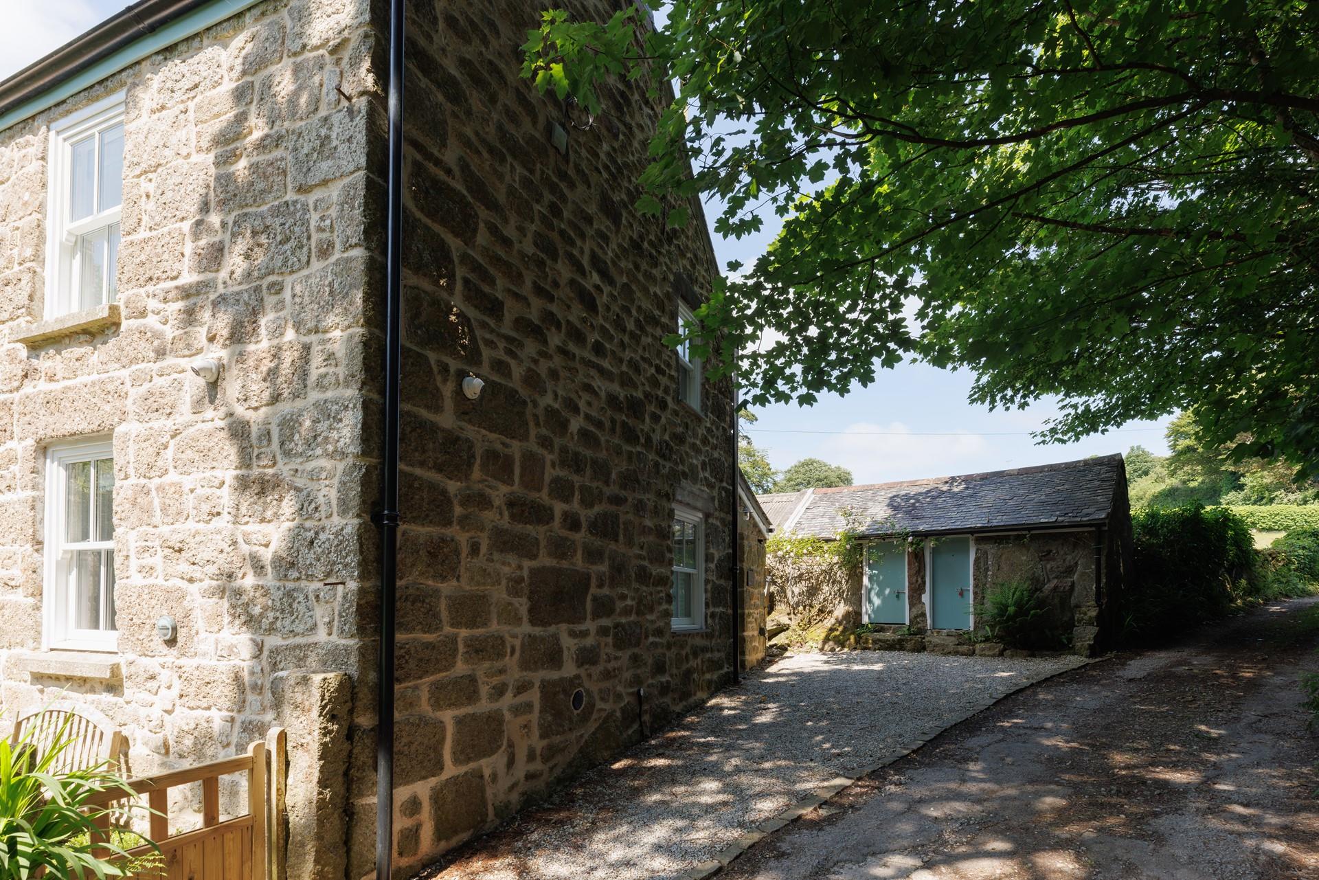 There's private parking to the side of the cottage.