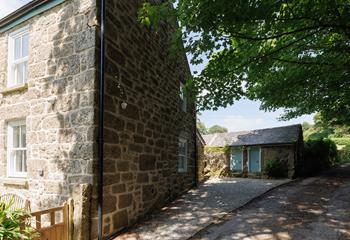 There's private parking to the side of the cottage.