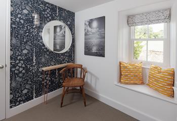A quaint window seat with views across the Cornish countryside