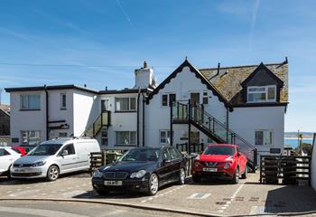 The apartment has a handy parking space.