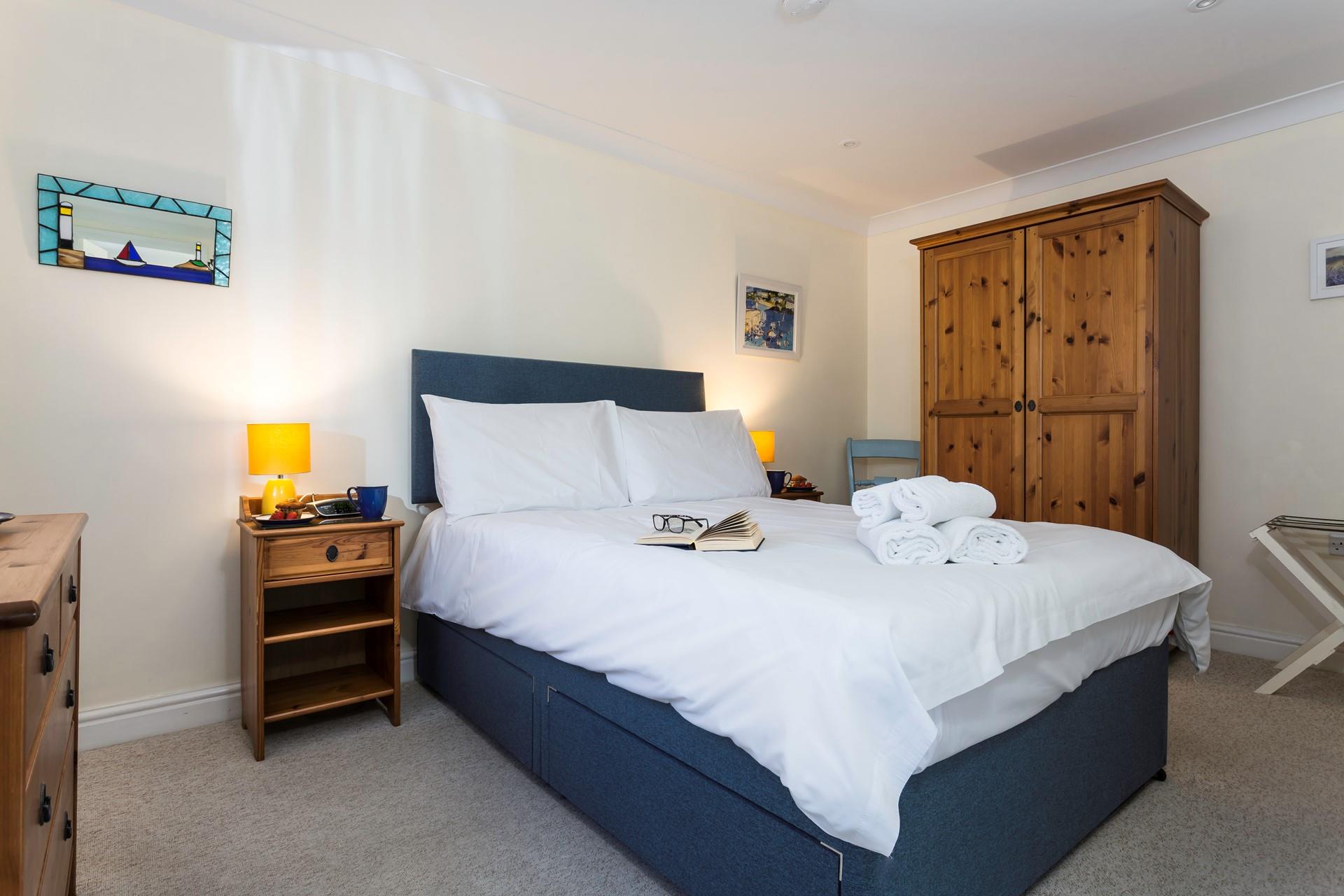 Tuck into the spacious double bed and sink into a dreamy night's sleep.