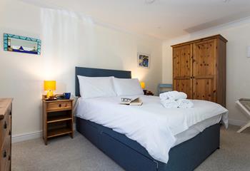 Tuck into the spacious double bed and sink into a dreamy night's sleep.