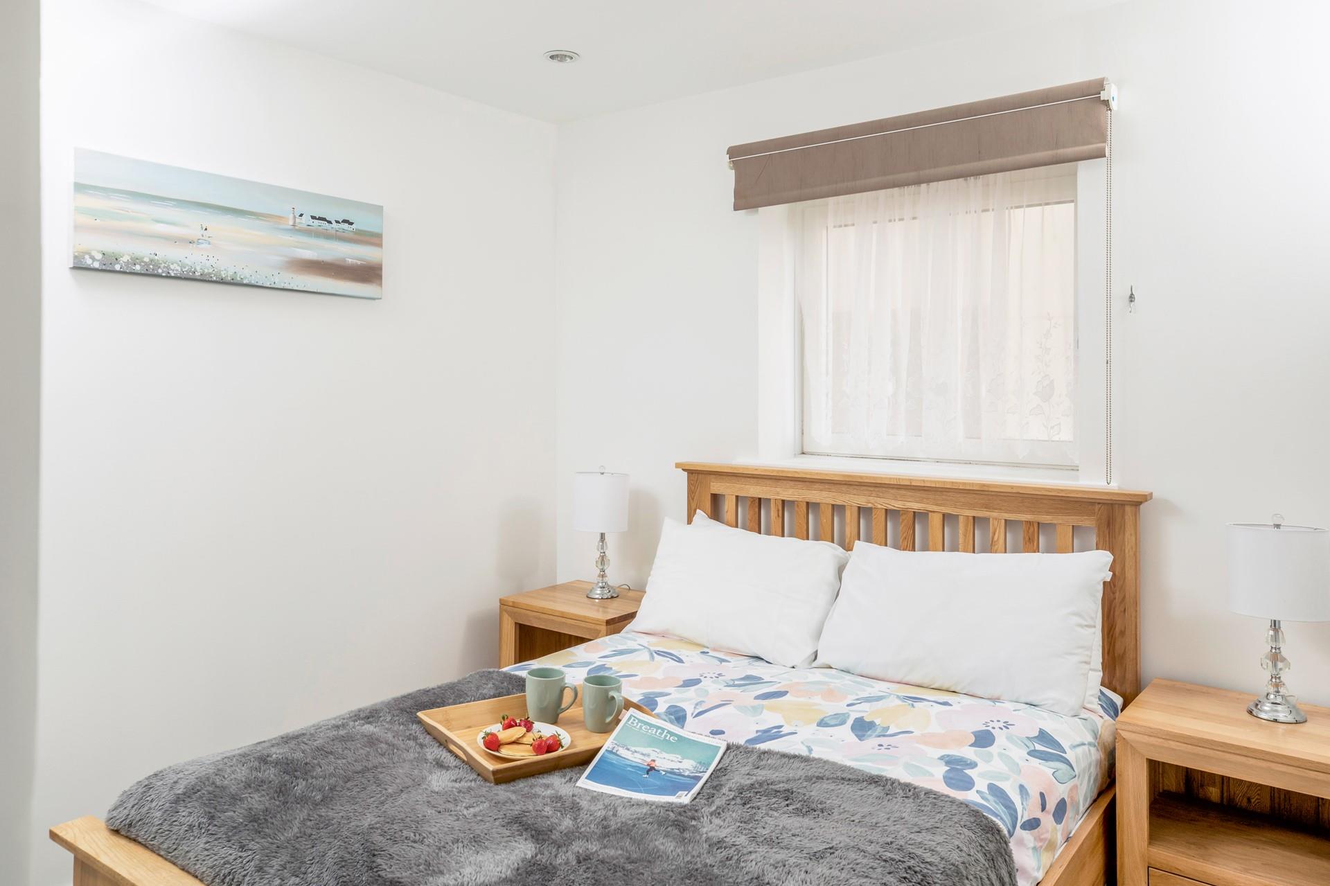 Bedroom 1 has a spacious double bed to sink into each night.