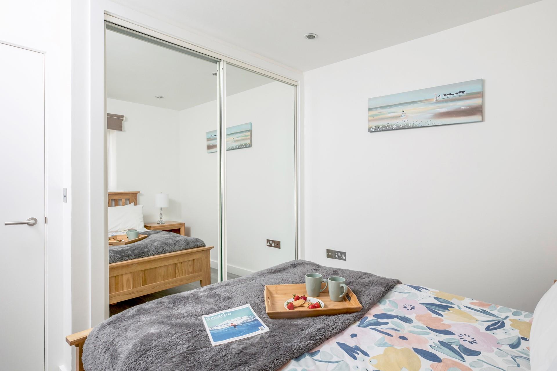 The large wardrobe has plenty of room to unpack.