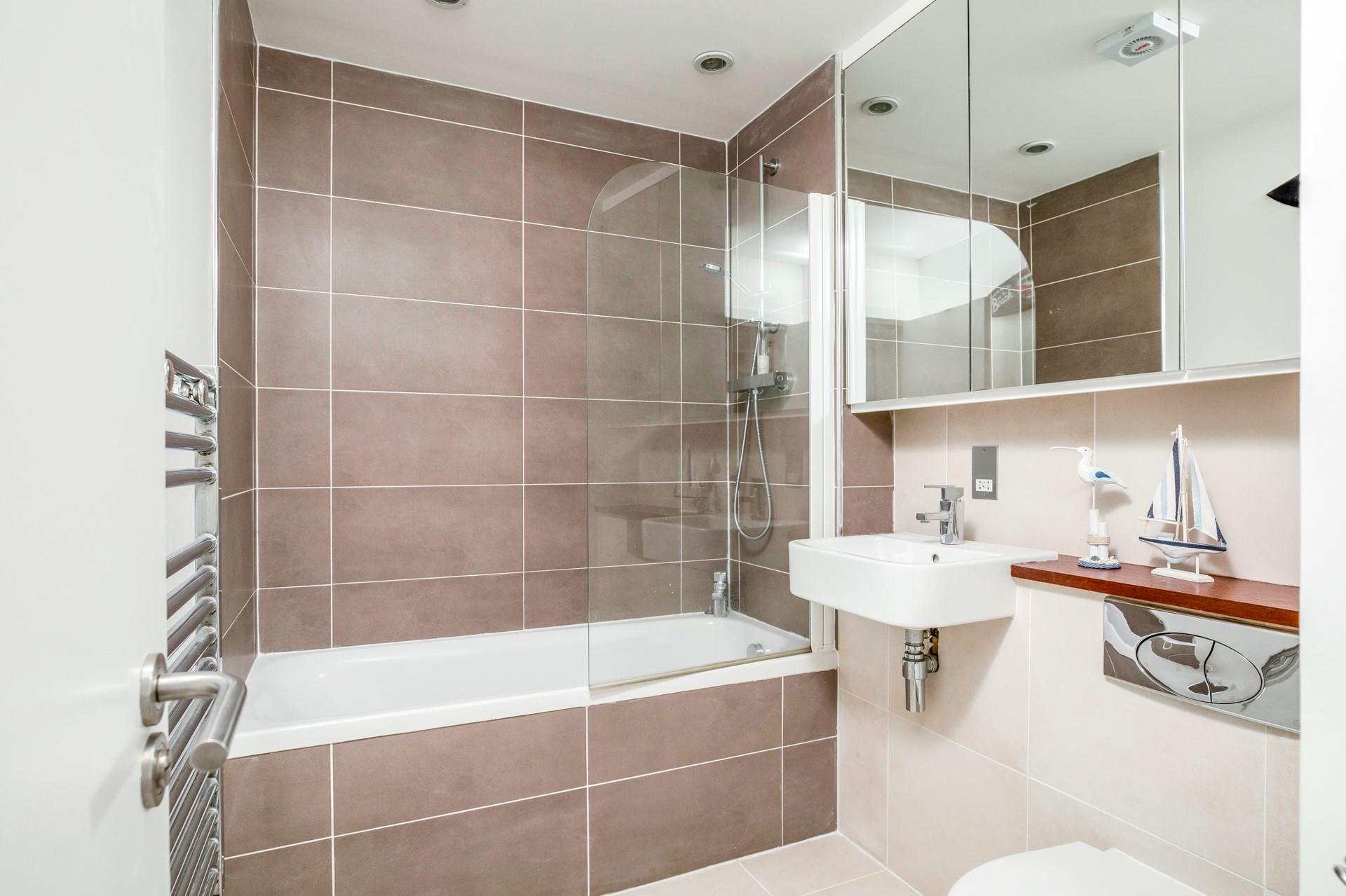 The family bathroom is the ideal space to get ready each day.