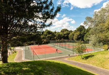 Take a change from the beach days and take part in a friendly game of tennis.