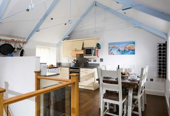 The kitchen and dining area have plenty of space to entertain the whole family at meal times.