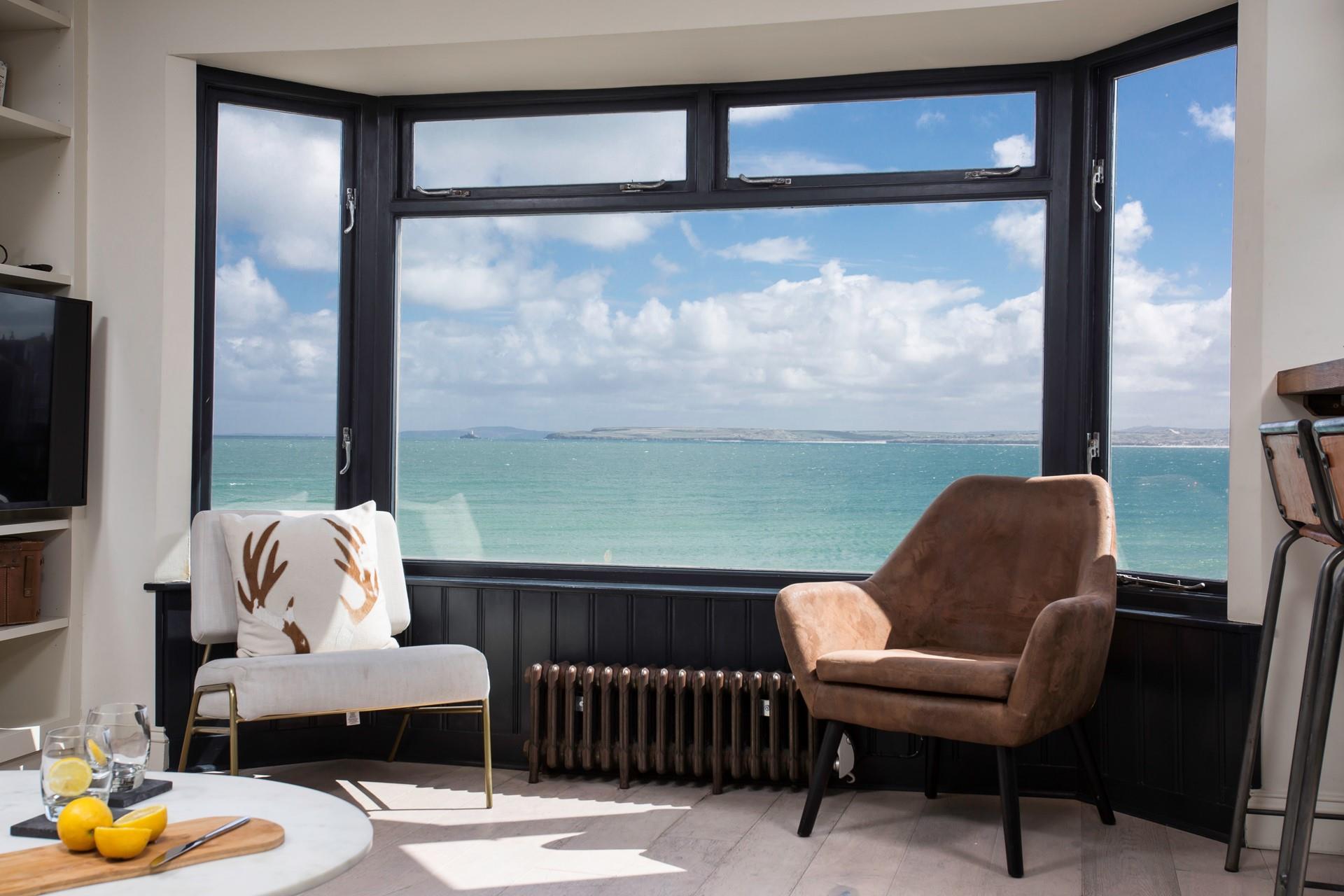 Sit in the window seat and watch the waves ebb and flow.