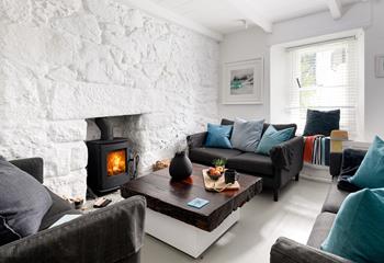 The sitting room is cosy, perfect for nights in front of the fire.