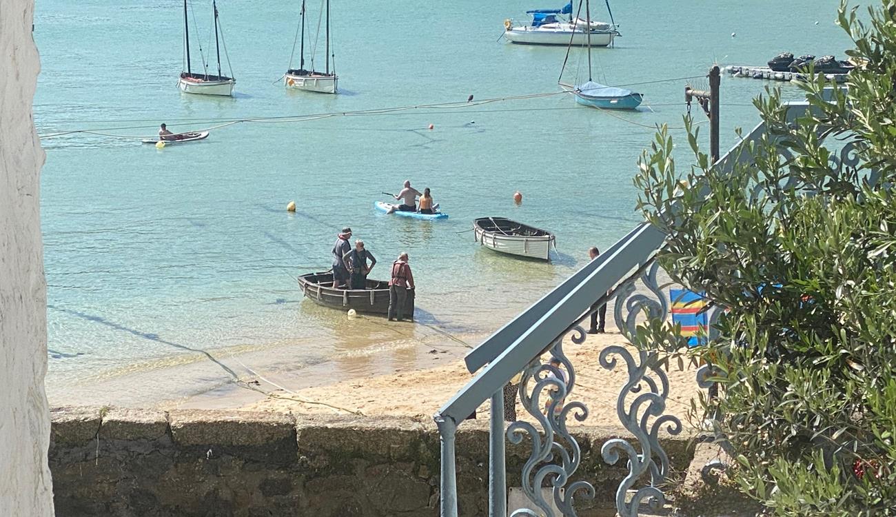 Take a morning dip or paddleboard in the turquoise waters.