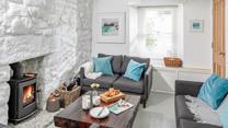 Listen to the crackle of the fire whilst you sink into the comfortable sofa.