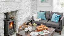 The sitting room is cosy, perfect for nights in front of the fire.