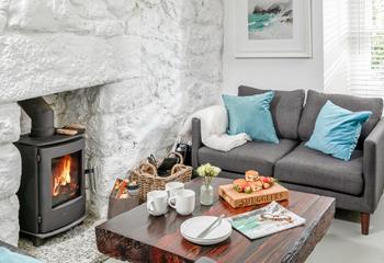 The sitting room is cosy, perfect for nights in front of the fire.