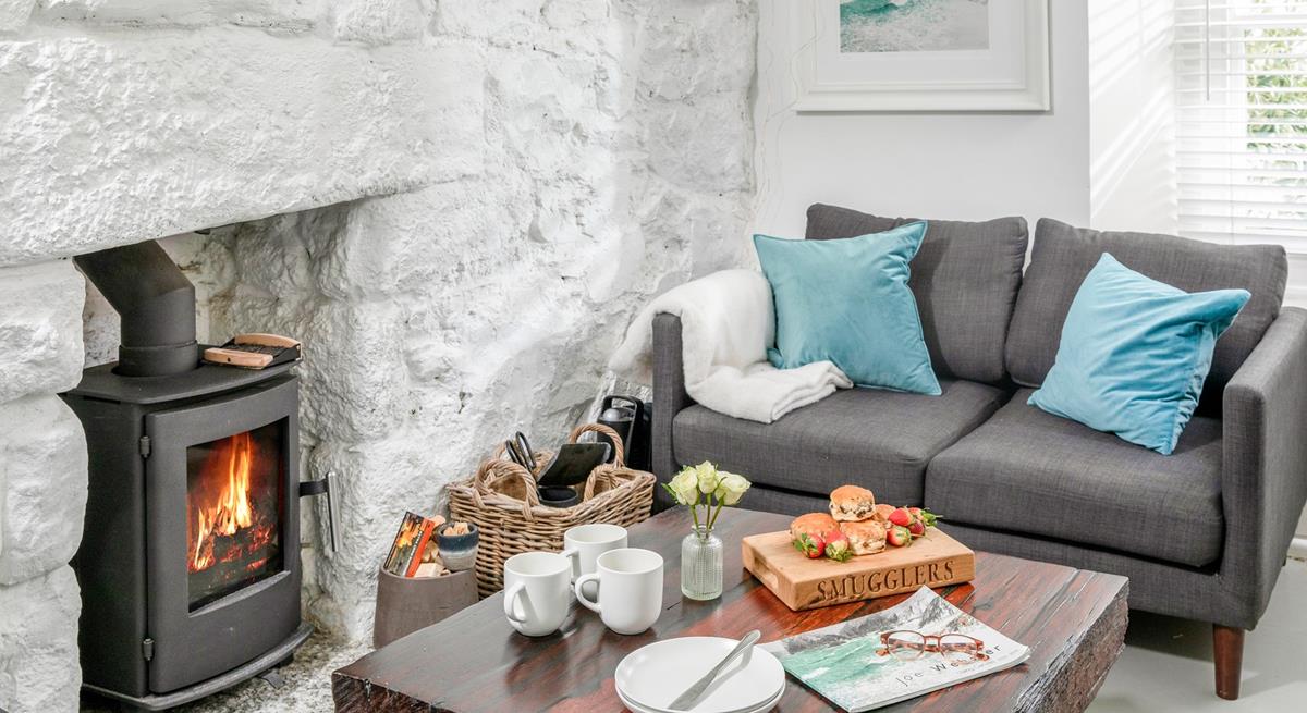 The sitting room is cosy, perfect for nights in front of the fire.