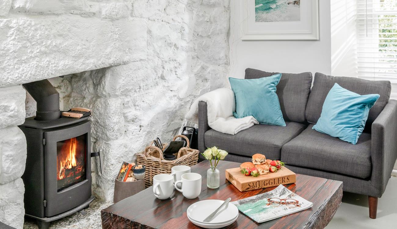 The sitting room is cosy, perfect for nights in front of the fire.