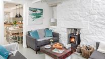 The sitting room is cosy for relaxing evenings in.