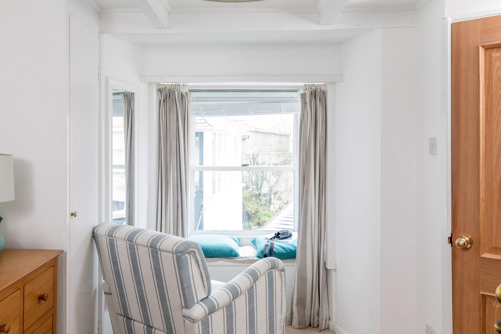 Relax in the armchair with a cuppa.