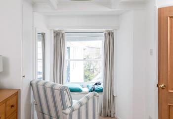Relax in the armchair with a cuppa.
