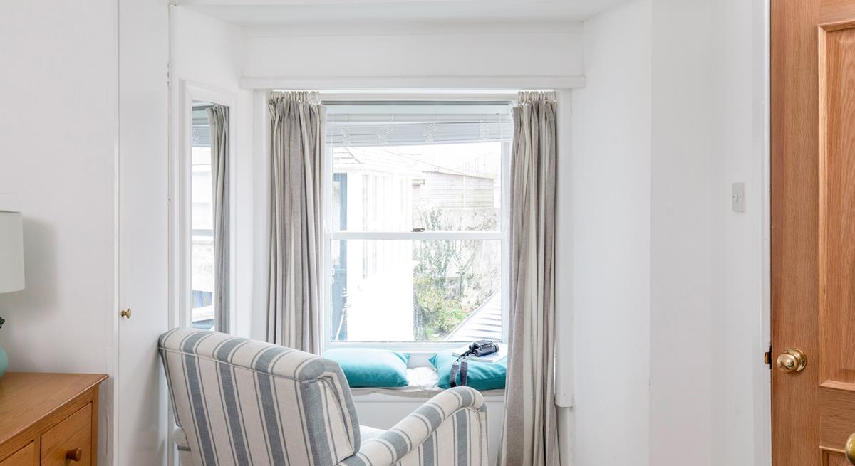 Relax in the armchair with a cuppa.