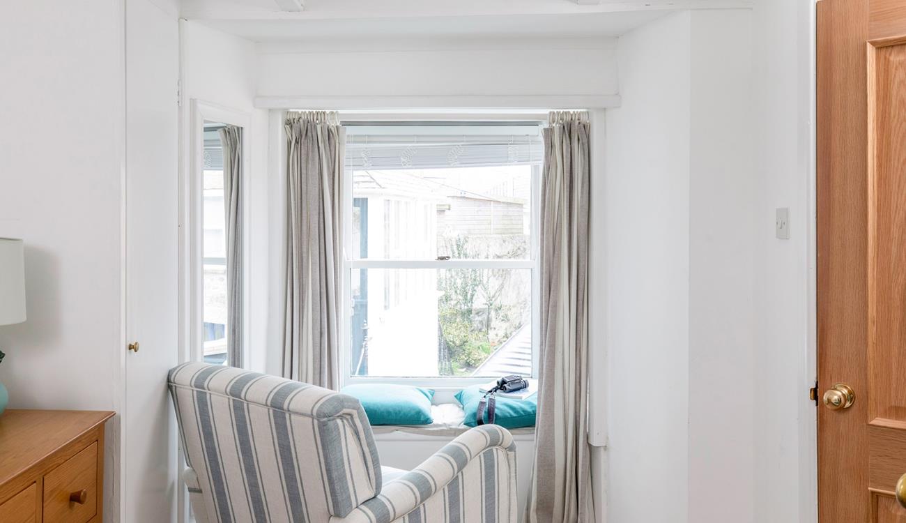 Relax in the armchair with a cuppa.