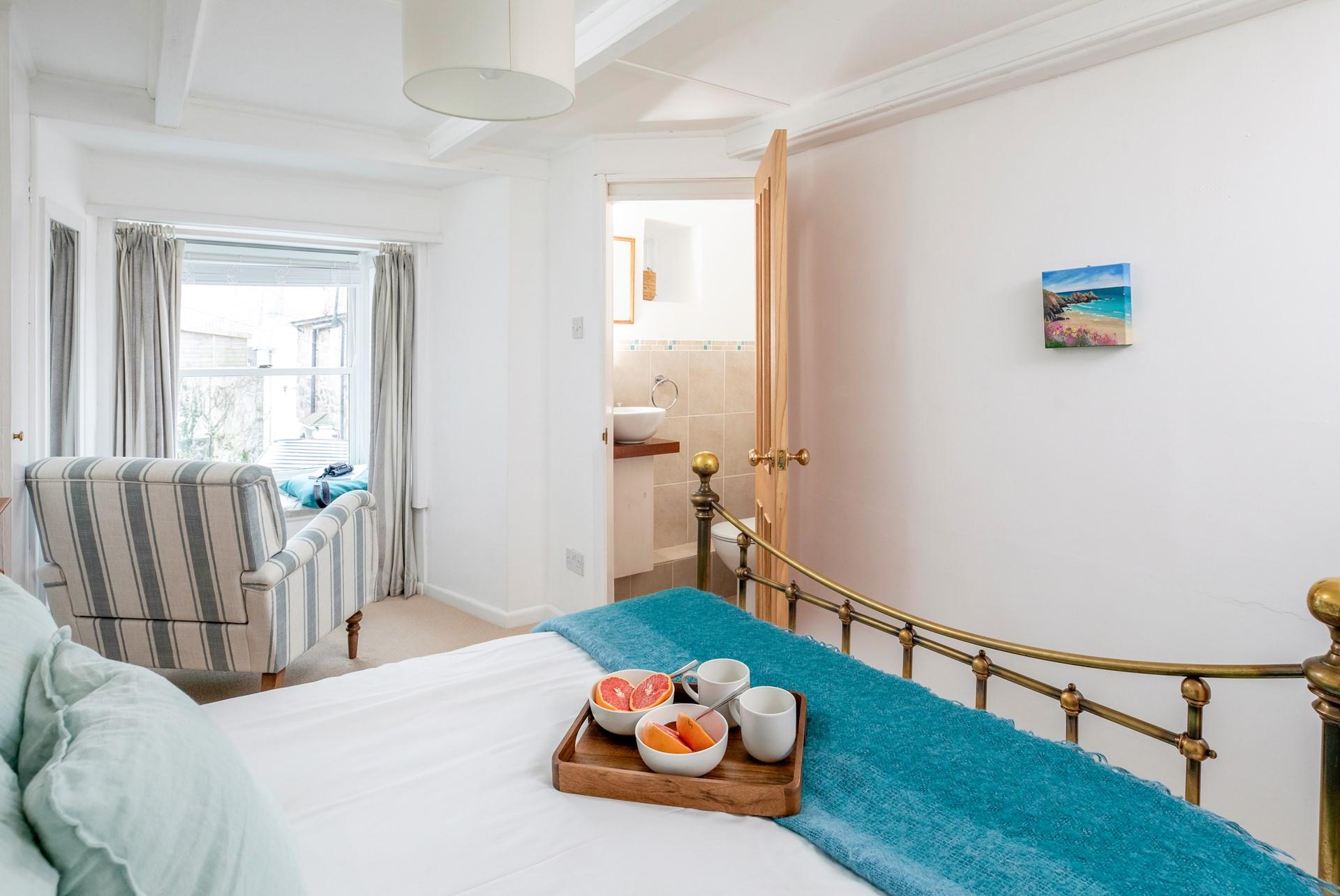 Wake up and wander into the en suite to get ready for the day.