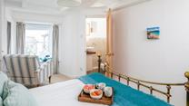 Wake up and wander into the en suite to get ready for the day.