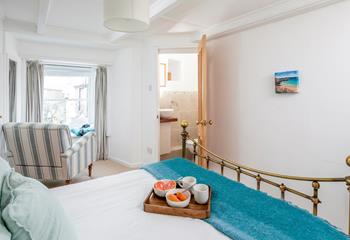 Wake up and wander into the en suite to get ready for the day.