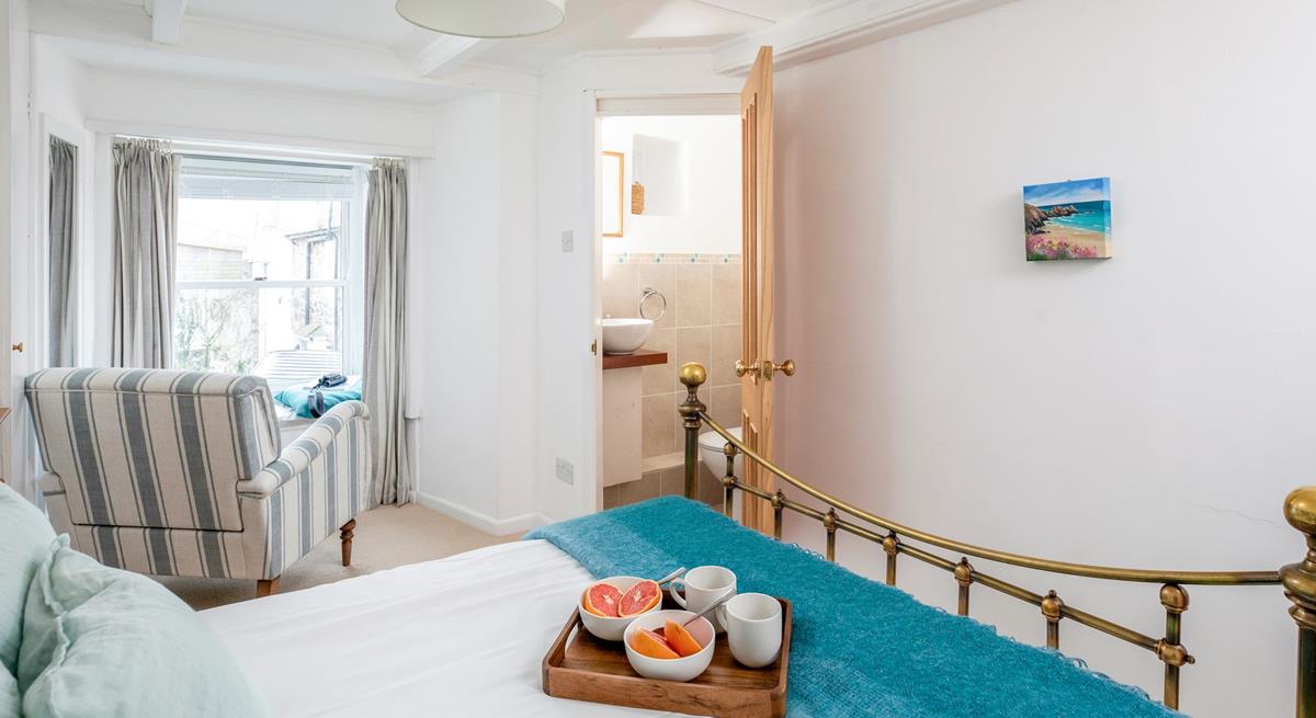 Wake up and wander into the en suite to get ready for the day.