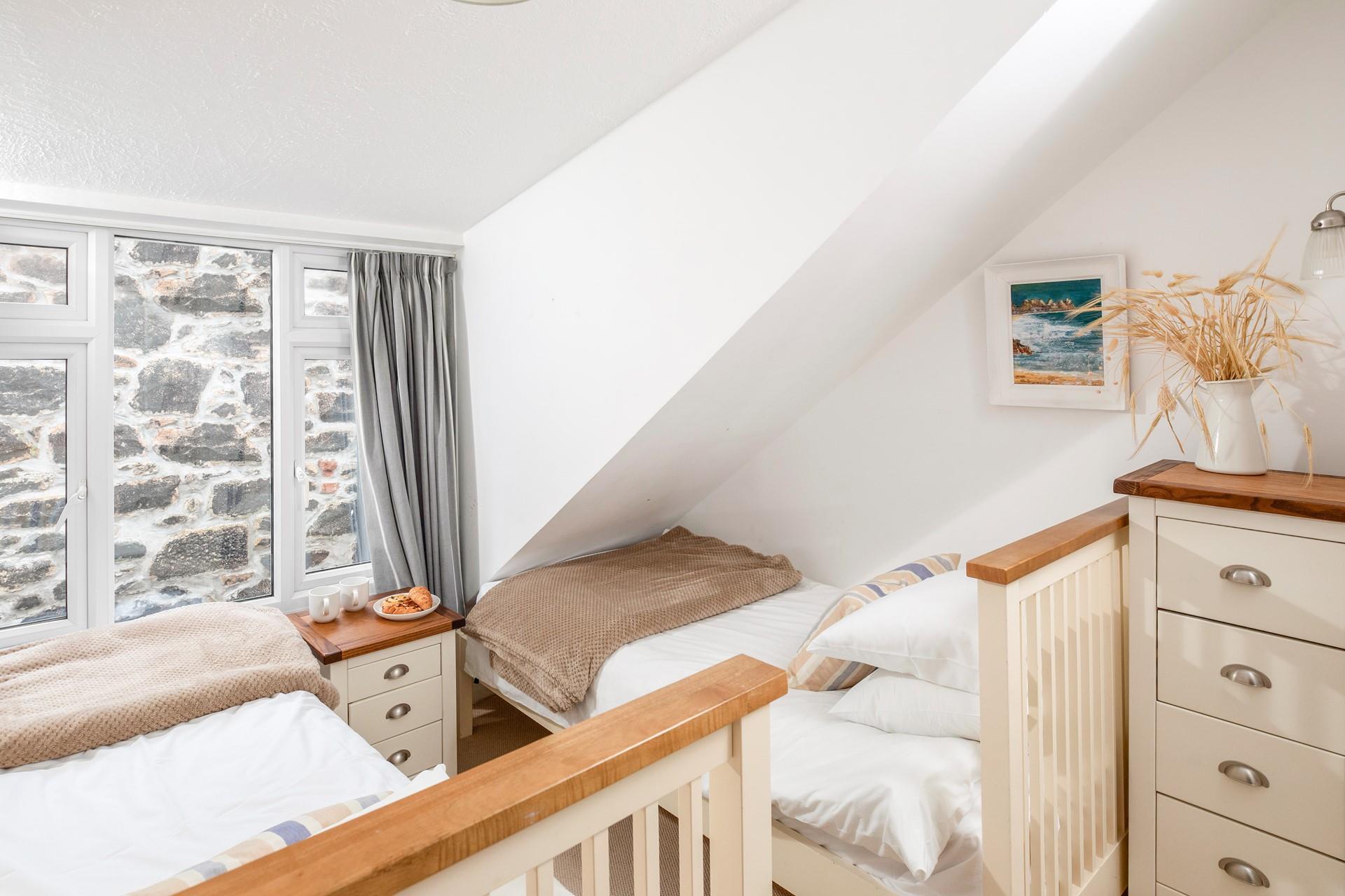 The twin beds are ideal for young adults or children.