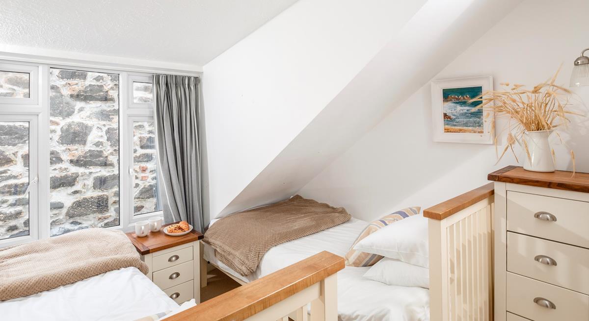 The twin beds are ideal for young adults or children.