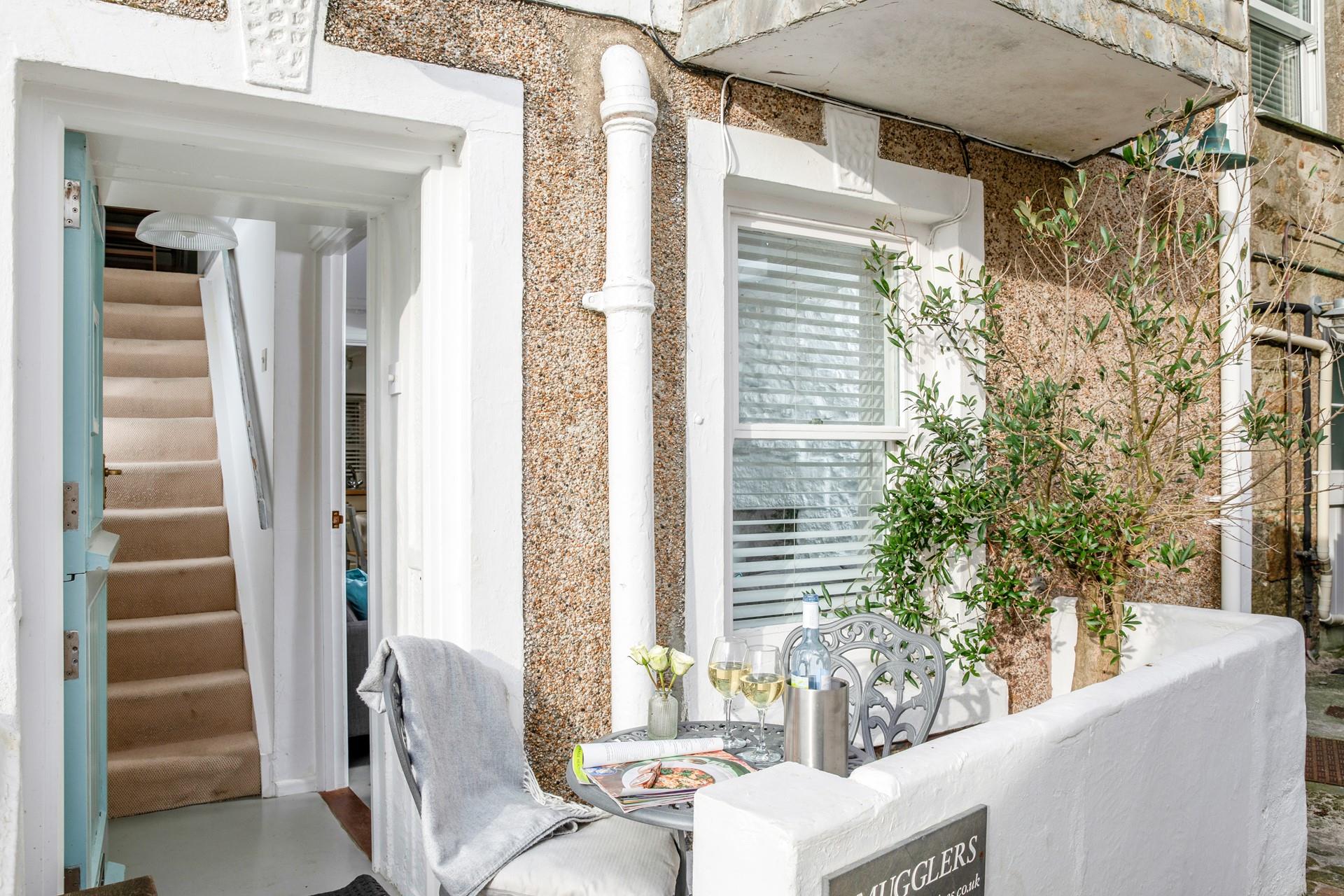 Watch the world go by in the courtyard.