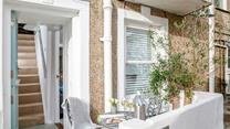 Watch the world go by in the courtyard.