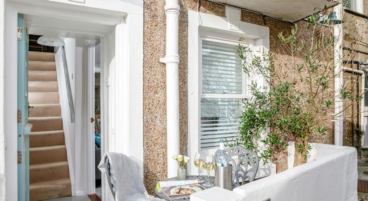 Watch the world go by in the courtyard.