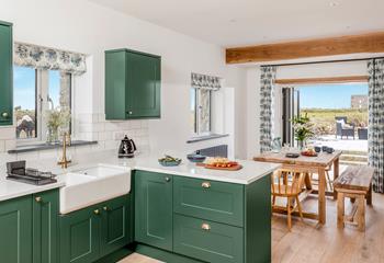 Let the summer breeze drift into the open plan kitchen and dining area.