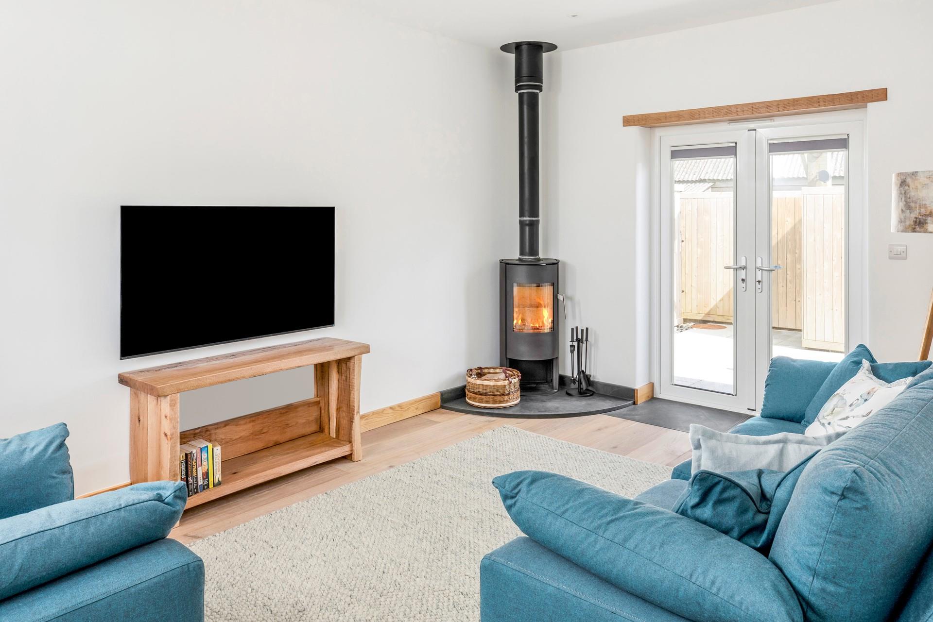 Light the woodburner and snuggle up on chilly evenings.