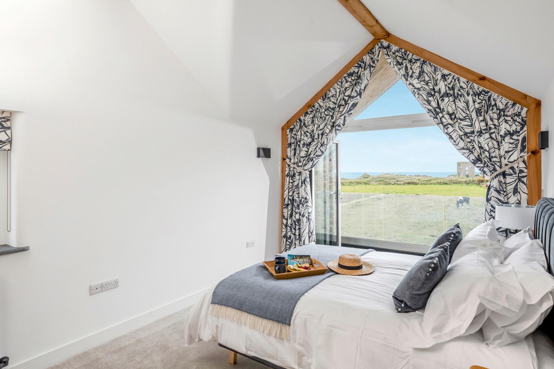 Open the balcony doors each morning to this beautiful view.