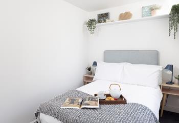 Sink into a relaxing slumber in the tranquil bedroom.