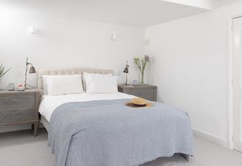 The bedrooms are decorated with lovely neutral tones and beautiful furnishings.