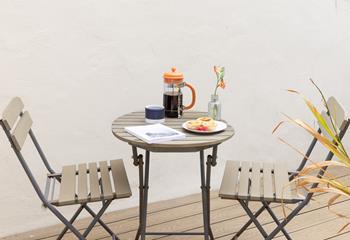 Get stuck into a good book as the sun goes down.