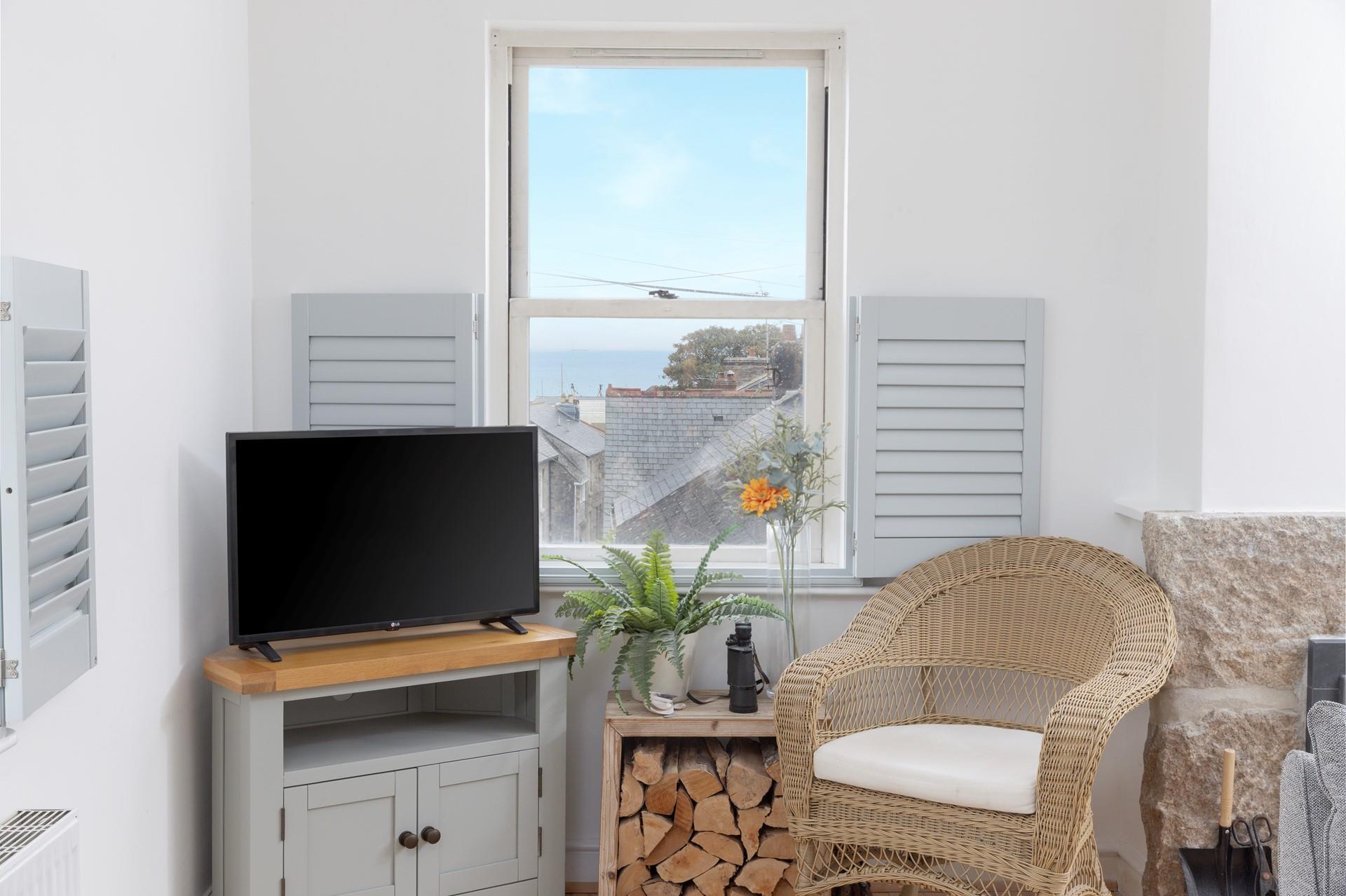 Enjoy sea glimpses across the rooftops of Penzance.