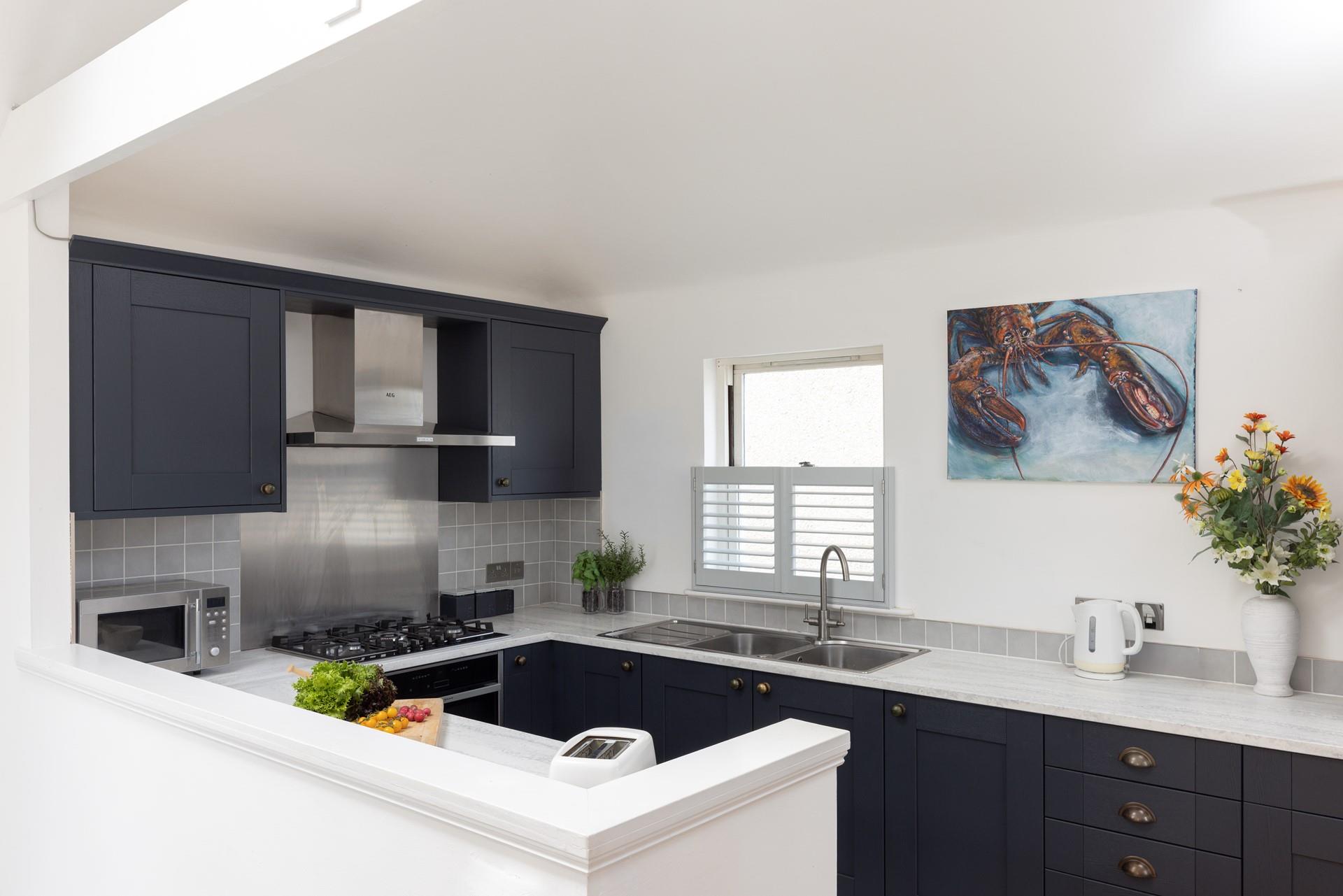 Cook up a storm in the stylish kitchen.