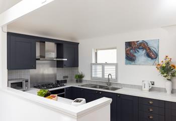 Cook up a storm in the stylish kitchen.