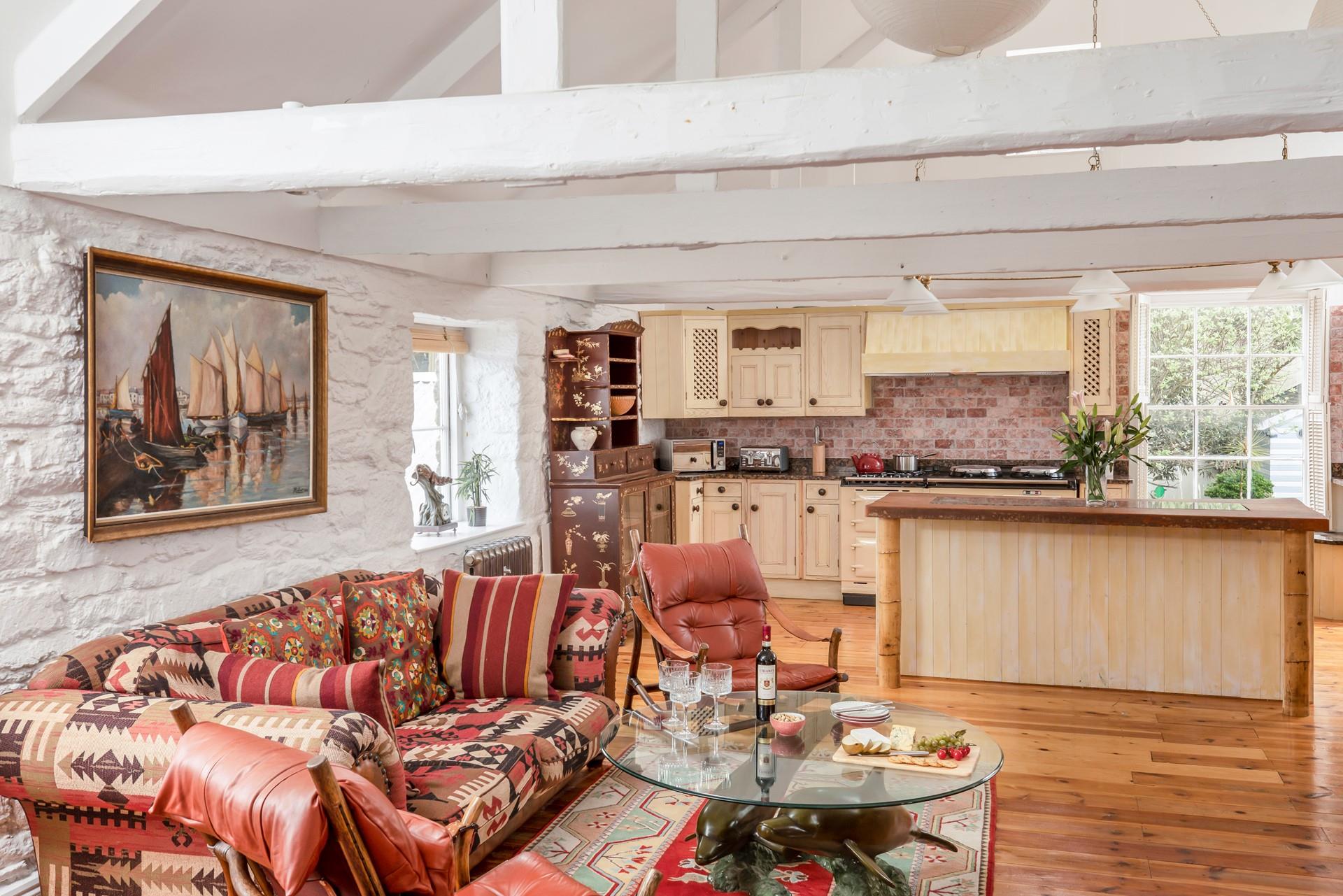 The open plan living area is ideal for entertaining and dining with loved ones.