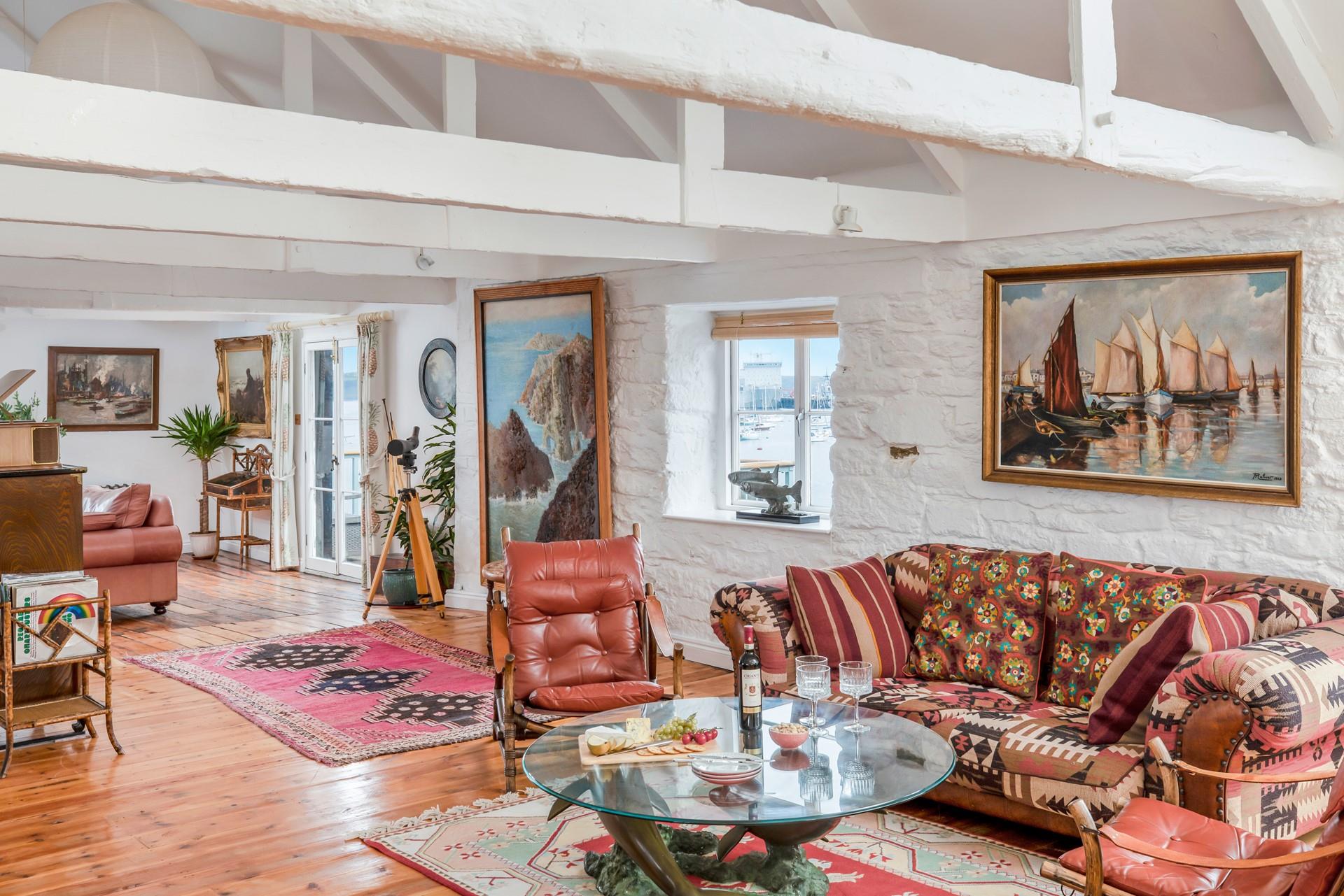 We love the nautical artwork in the sitting room!